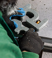 A craftsperson assembling a detailed object